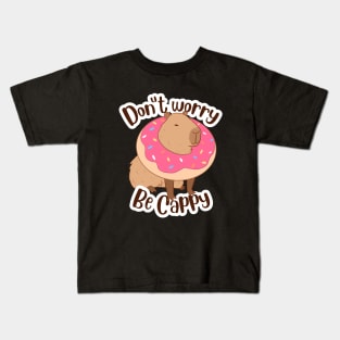 Don't worry be cappy - a cute capybara in a dount Kids T-Shirt